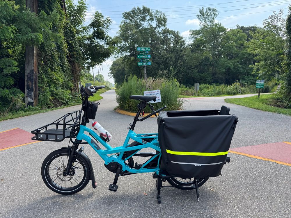 Tern GSD S00 LX parked at the Velo Underound on the southwest side of Madison, Wisconsin. It shows trail signs for 5 different multi-use bike paths. #ebike