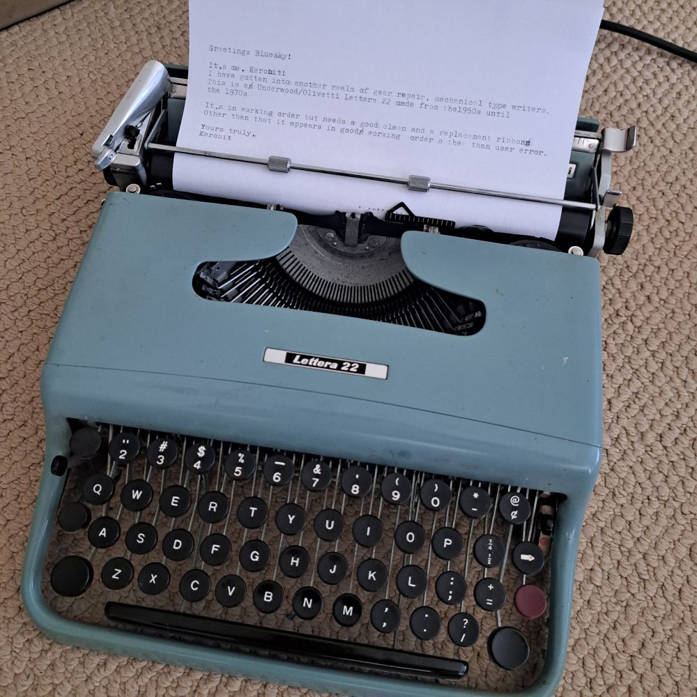 A typewriter with a letter