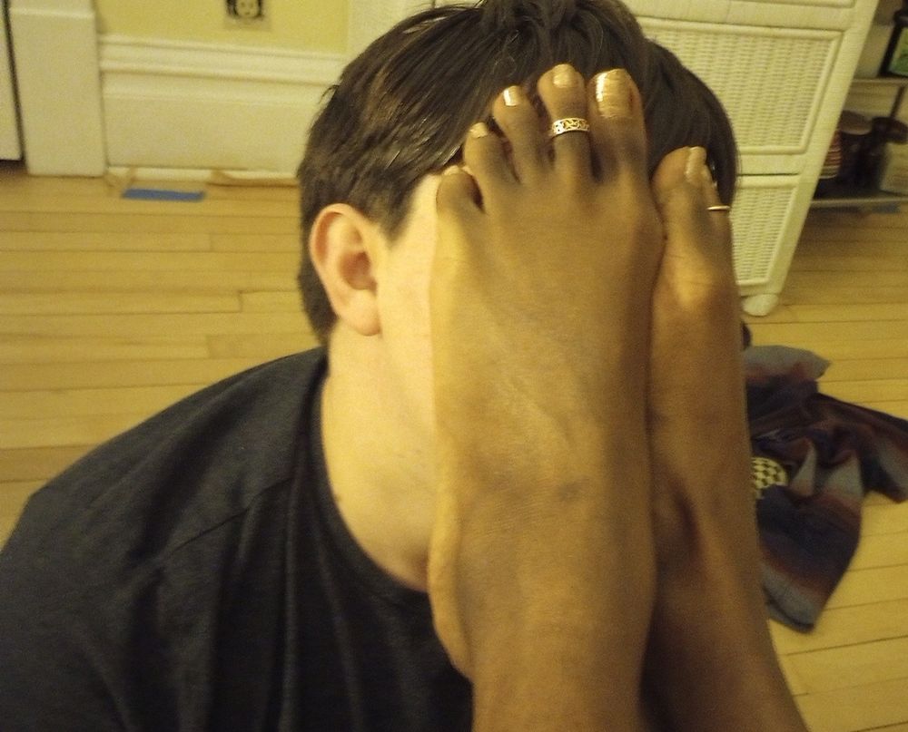 A very lucky and privileged sub having their face buried underneath Sharice's soft, creamy, stinky, and regal ebony Goddess feet