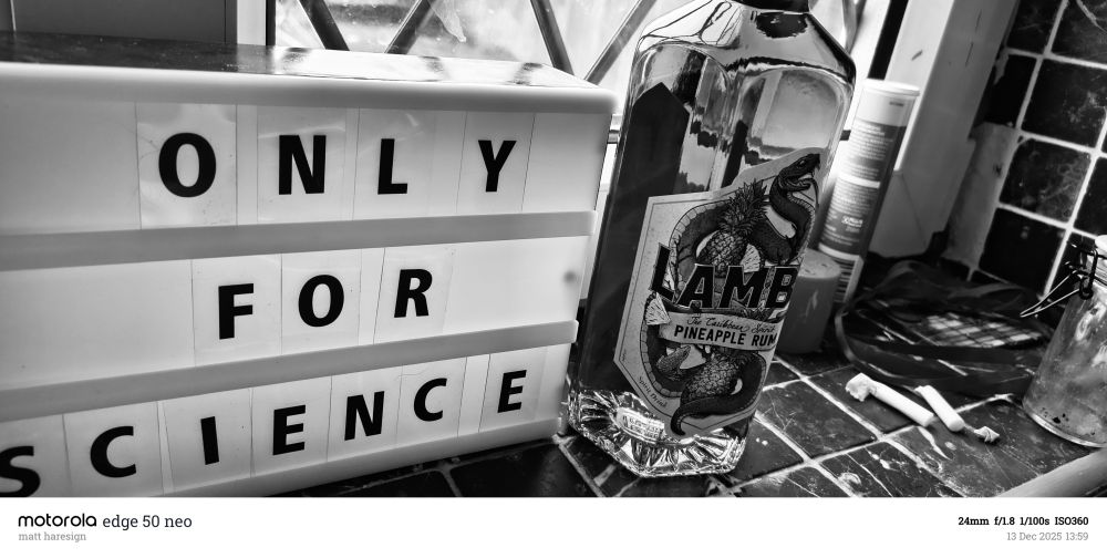 Lightboard with the words only for science next to a bottle of pineapple rum. Bugger.