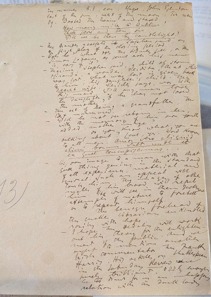 A page of slanting scribbles on old brown paper, with a wide left margin.