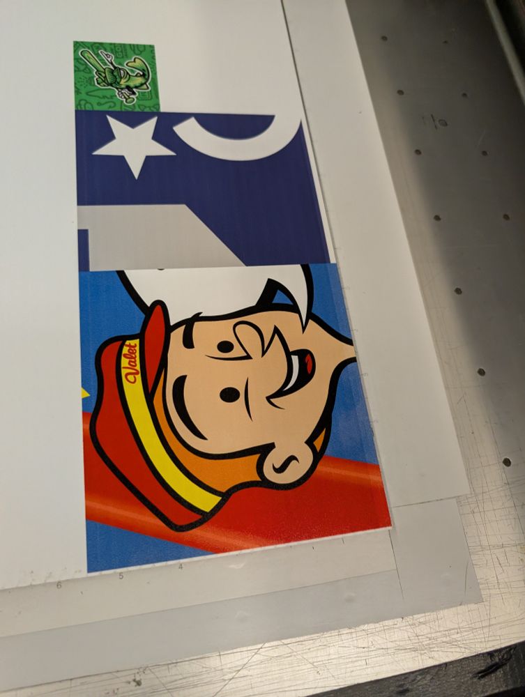 Three local business logo excerpts from previous jobs that I used to demo a spectrum of colours printed on 6mm coroplast and stilling on the flatbed of an OCE Arizona 350GT after I calibrated my CYMK balance by eye