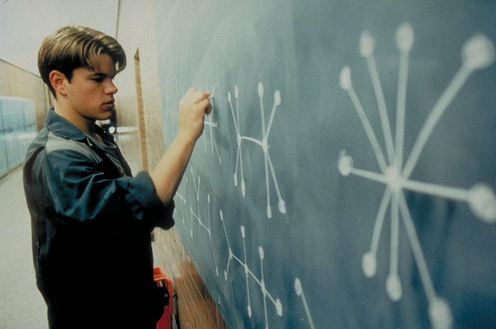 Still from Good Will Hunting, Matt Damon character (a janitor) is solving something complex on the chalkboard 
