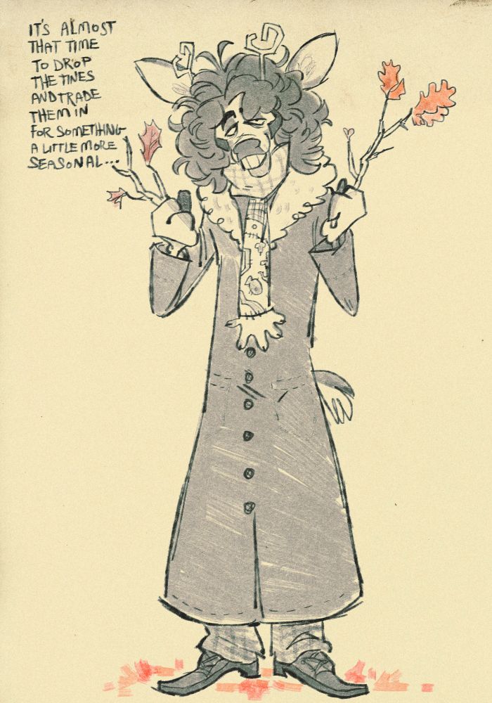 Ashton wearing his cold weather attire, holding two sticks and saying "it's almost time to drop the tines and trade them in for something a little more seasonal."