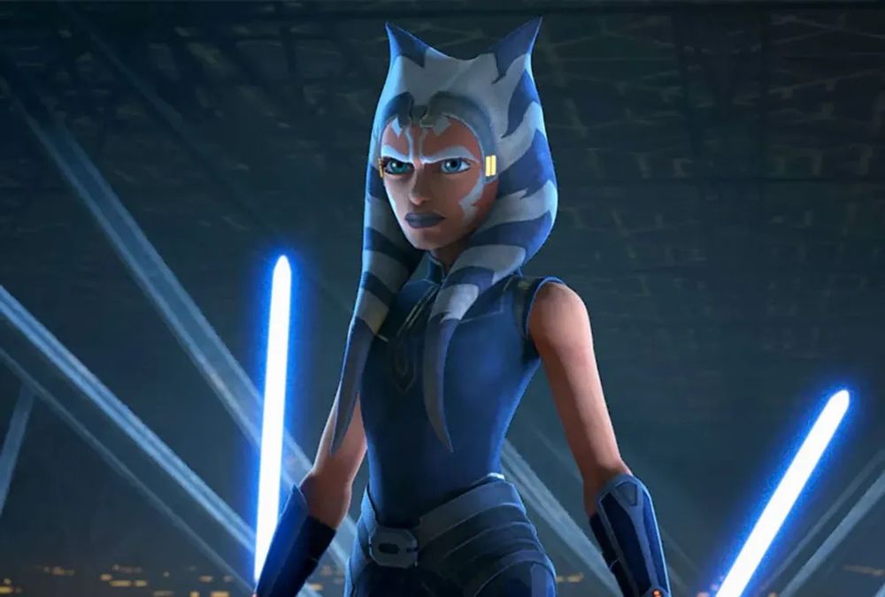 Ahsoka Tano in Star Wars: The Clone Wars igniting her blue lightsabers in the episode “The Phantom Apprentice”