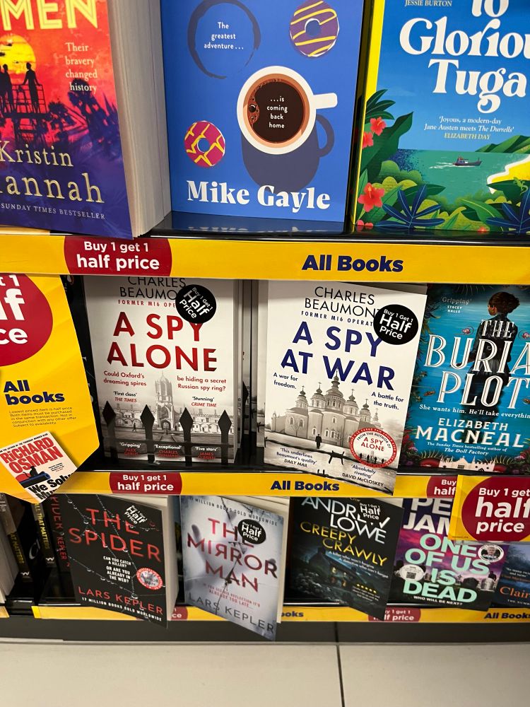 Charles Beaumont Spy Alone novels on a shelf