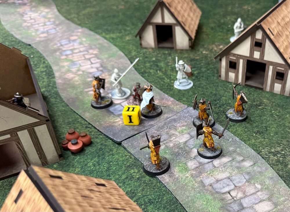A Pillage battlefield, Easterlings square off against Baron’s War models in a small village