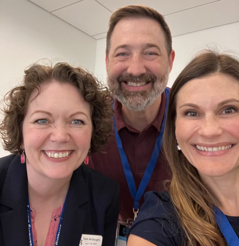 selfie pic of Tosh McGaughy, Travis Leech, & Natalia Heckman. All are wearing lanyards for the ESC16 conference in Canyon.