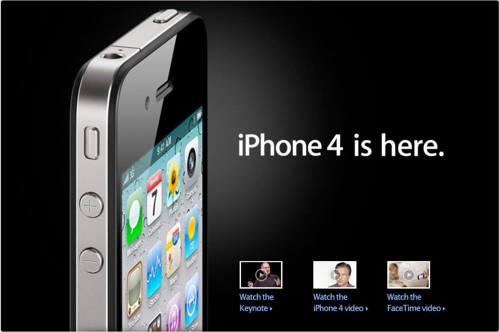 A screenshot of a page on Apple's website that says "iPhone 4 is here." To the left of the text is a photo of the iPhone 4, and underneath are 3 video links that read "Watch the Keynote, Watch the iPhone 4 video, and Watch the FaceTime video" respectively.