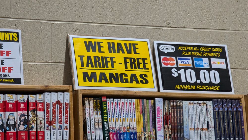Sign that reads: "we have tariff-free manga" 