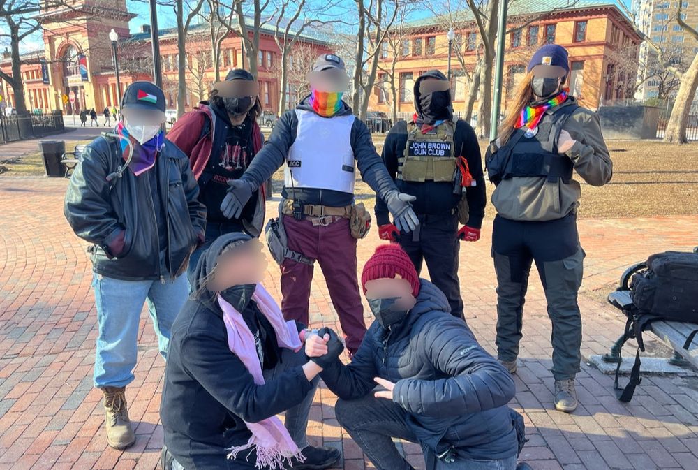 Seven community defenders from RIJBGC and CTJBGC pose for a photo
