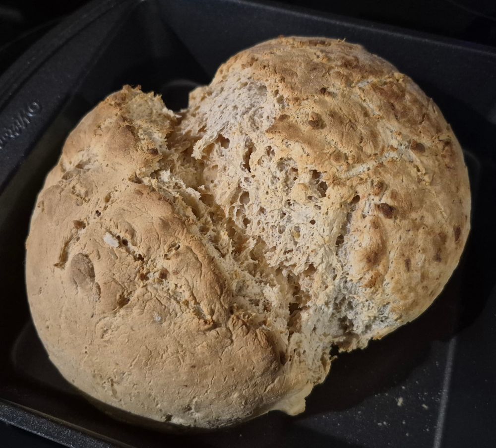 Freshly baked roasted garlic and sundried tomato bread. Looks a little funky having partially split itself in two while baking but it smells amazing. 