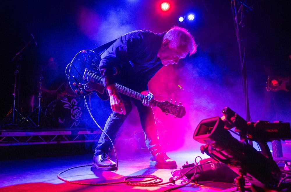 David Gedge performing on stage