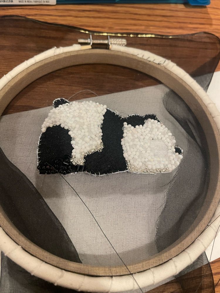 Partially finished panda bead embroidery work