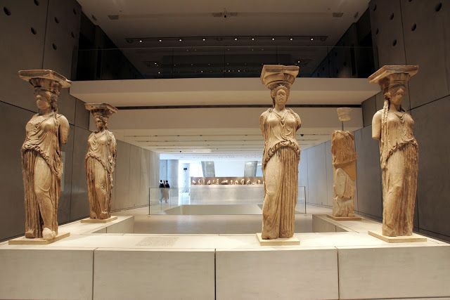Caryatid display at the Acropolis Museum in Athens, with a spaced reserved for the one Caryatid currently within the British Museum.