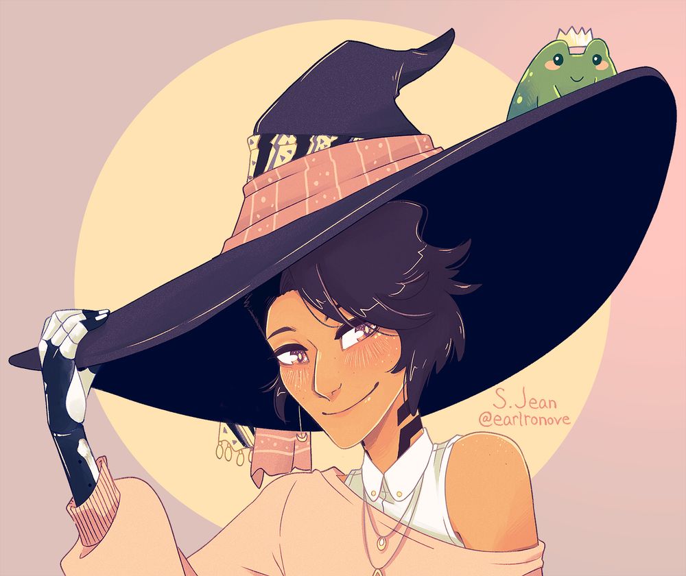 A witch with a large black hat and a cute green frog with a crown sitting on the brim of the hat. The witch has tan skin, dark hair, and ember colored eyes. They are smiling. Their right hand, which is touching the brim of the hat, is more doll-like with a black surface and white accents around the fingers. 