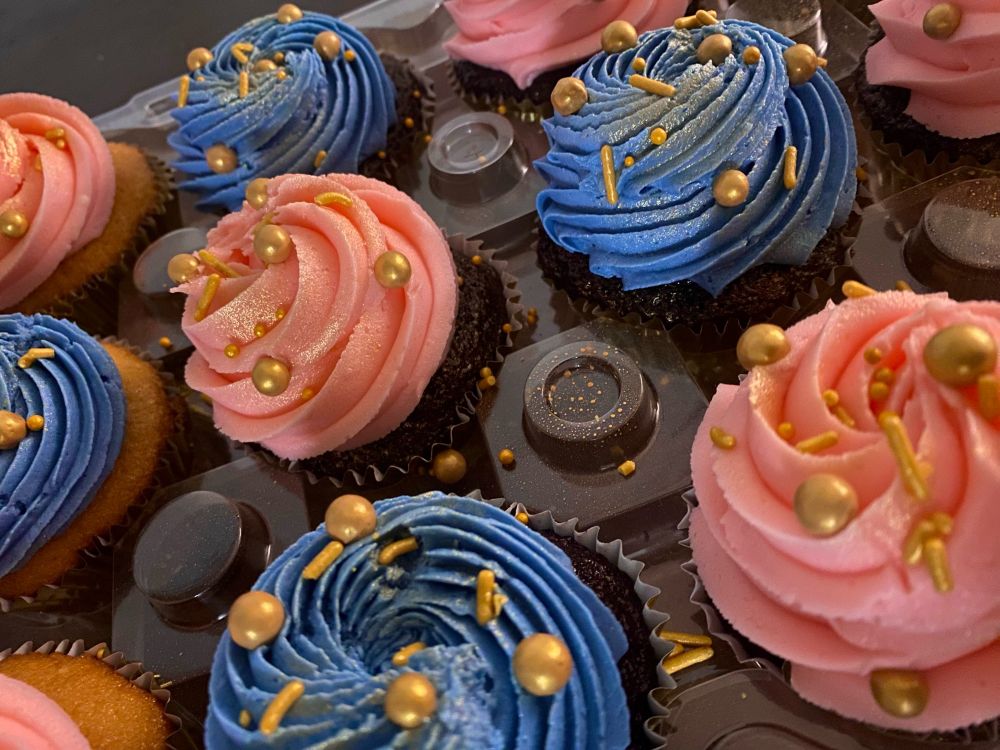 Blue and pink cupcakes with hints of gold luster!