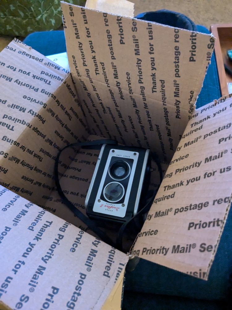 A shitty Kodak Duaflex II camera in an otherwise empty box