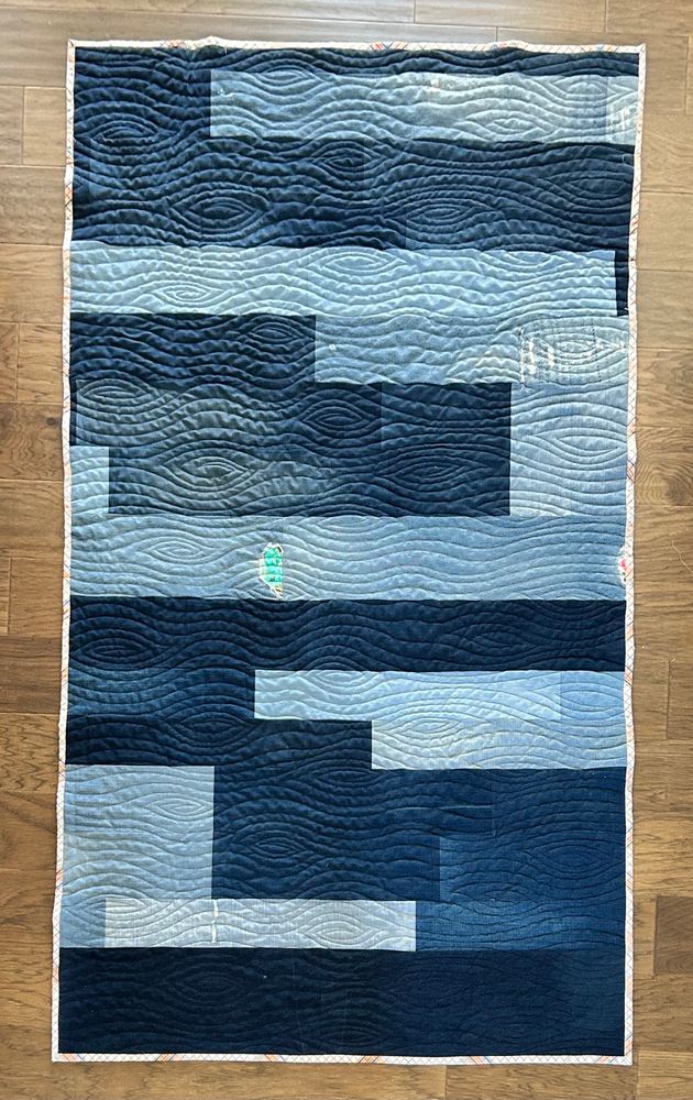 Finished blue jeans bathroom rug. 