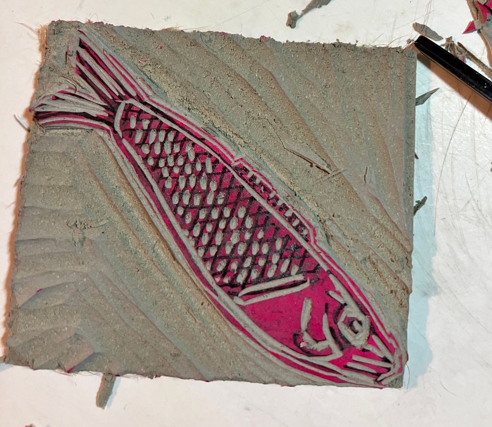 Carved Lino of a sardine fish