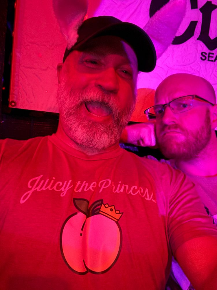 Me in a juicy the princess tshirt with my friend looking over my shoulder
