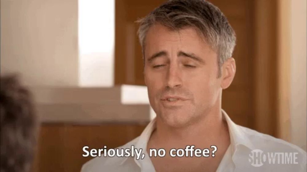 a man in a white shirt is saying `` seriously , no coffee ? '' .