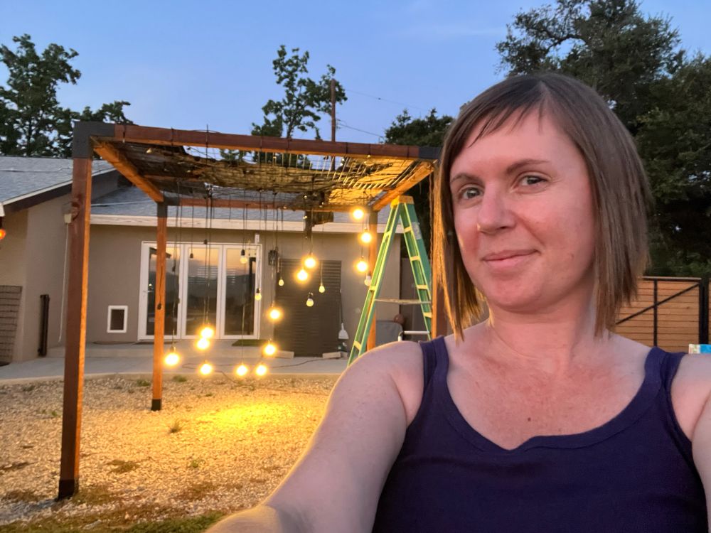 Selfie in front of the structure showing the lit Scorpius constellation. 