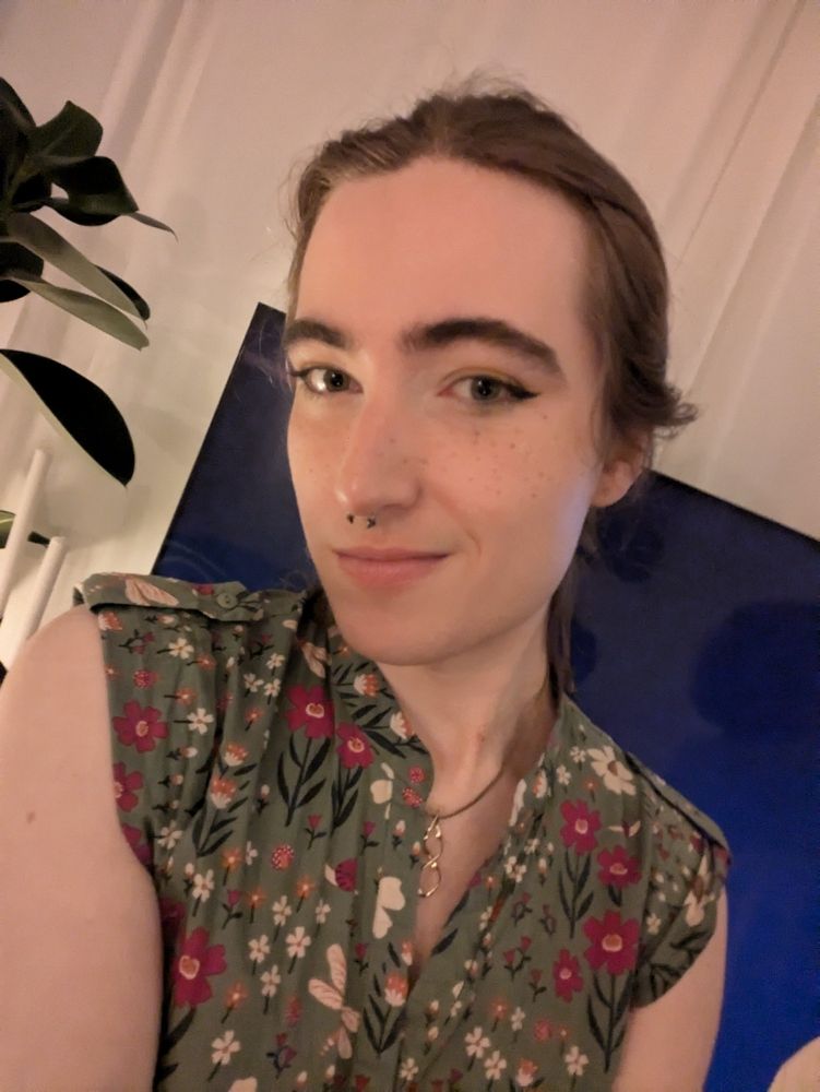 Alex with pretty makeup and a floral dress!!