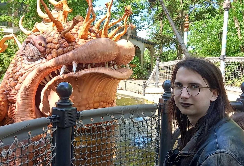 Esme next to a giant fish