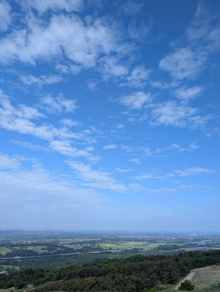 View from the top of Rivington. Blue skies and green hills