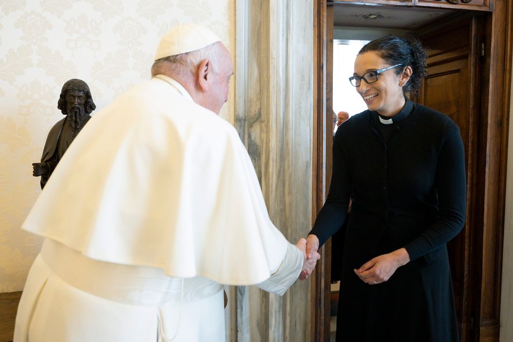 Me shaking hands with Pope Francis 