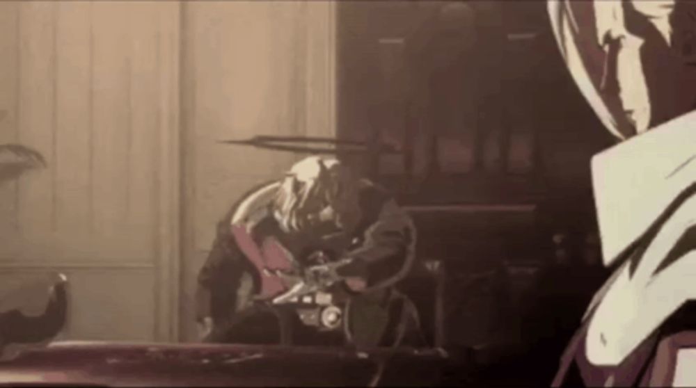 a man is playing a guitar in a room and another man is standing in the background .