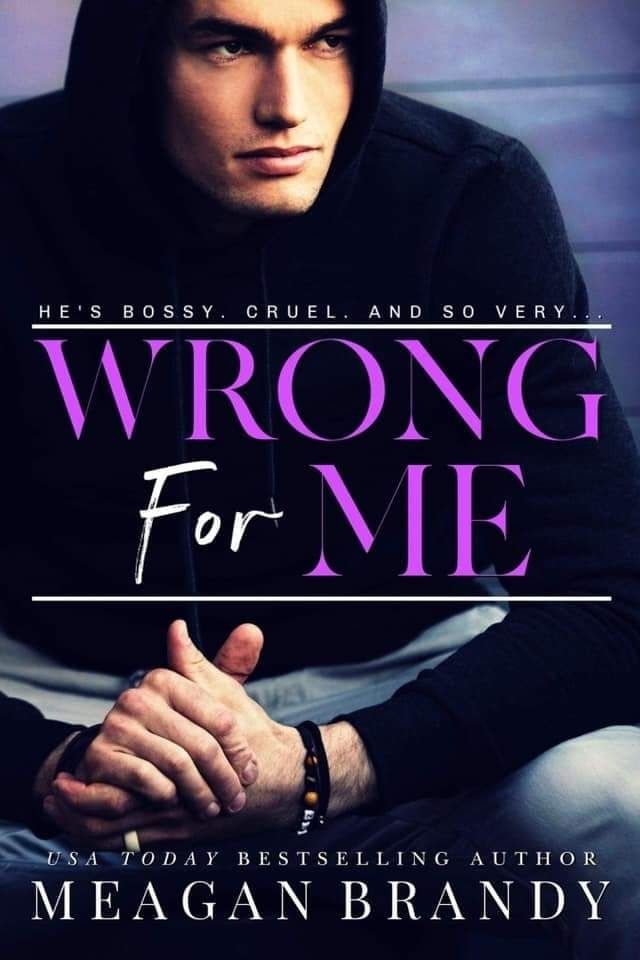 Wrong for Me cover by Meagan Brandy with Alec sitting in front of the camera looking towards the right. It says "He's bossy. Cruel. And so very..." Above the title. 