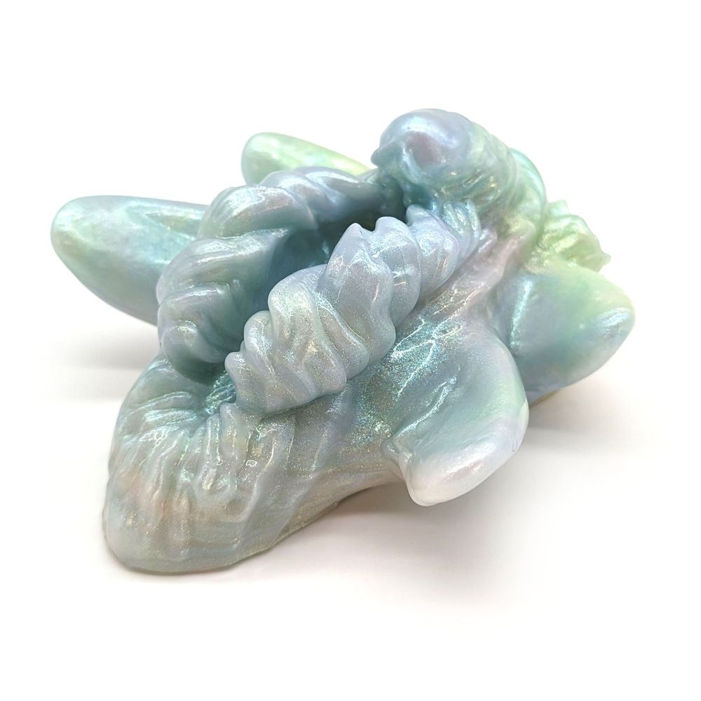 isonade penetrable toy from Hodge Podge Entourage in soft greens, purple, and blues.