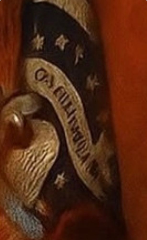 Zooming in on the flag to reveal gibberish written there