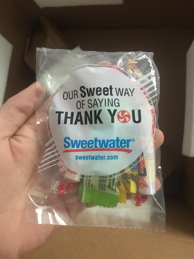 An image of a Bag of Candy from Sweetwater filled with assorted and sundry candies, like Sweet Tarts, Laffy Taffy, Bit o Honey, Peppermints, Jolly Ranchers, and more.