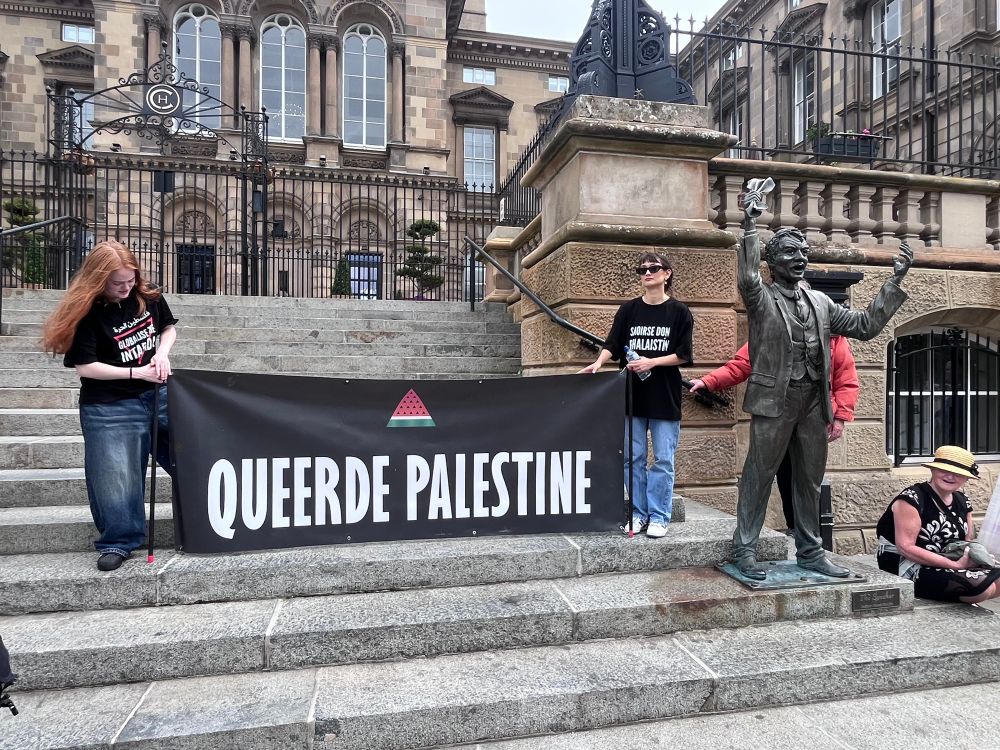 Queerde Palestine banner at the No Pride In Genocide march on the steps of Belfast Custom House.