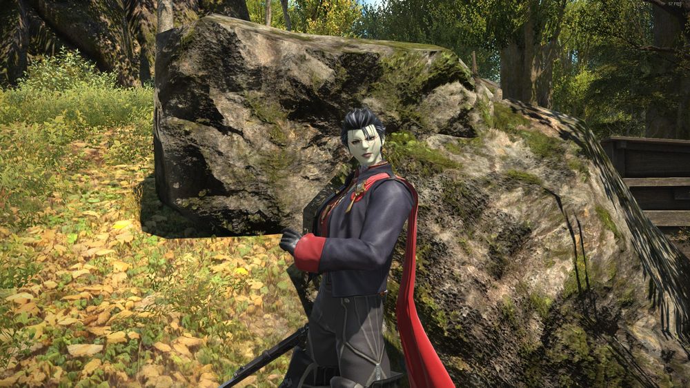 A screenshot of Final Fantasy XIV, depicting a bespectacled FemRoe amongst greenery, and looking rather princely. Her Gunblade is drawn and angled low behind her.