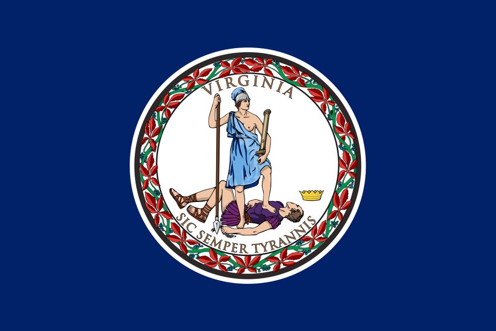 The state flag of Virginia. The flag has a navy blue background and a white seal in the middle. In the seal, a woman holding a spear, embodying Virtue, stands on the corpse of a man, presumably a king, whose crown has fallen from his head. The words “sic semper tyrannis” are written beneath the people - thus always to tyrants. A statement of fact and a warning.