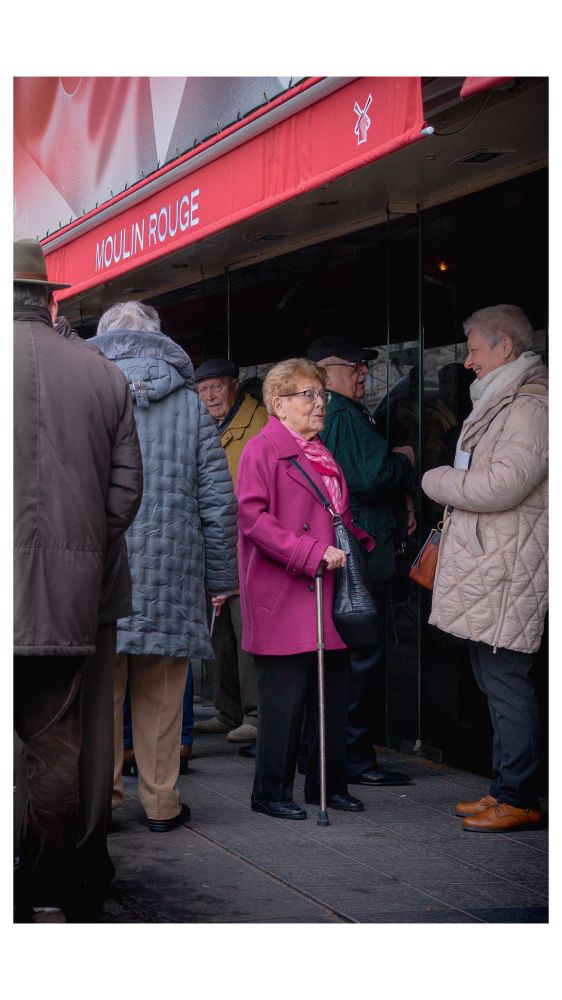 A senior lady resplendent in pink.