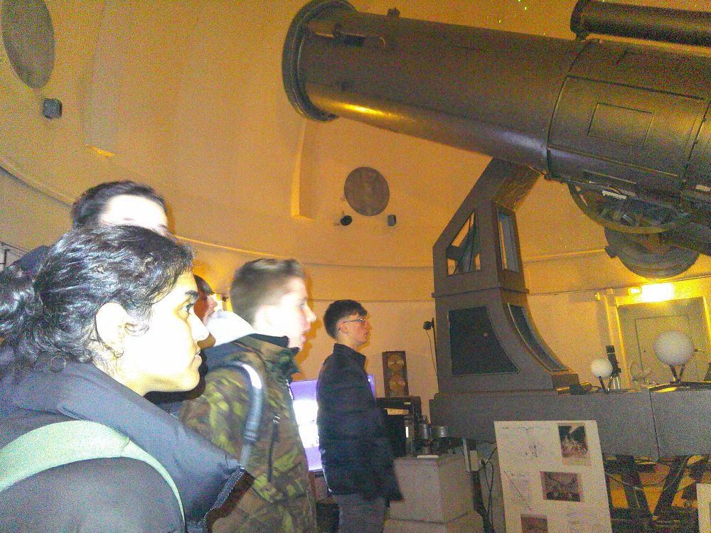 Students and a telescope