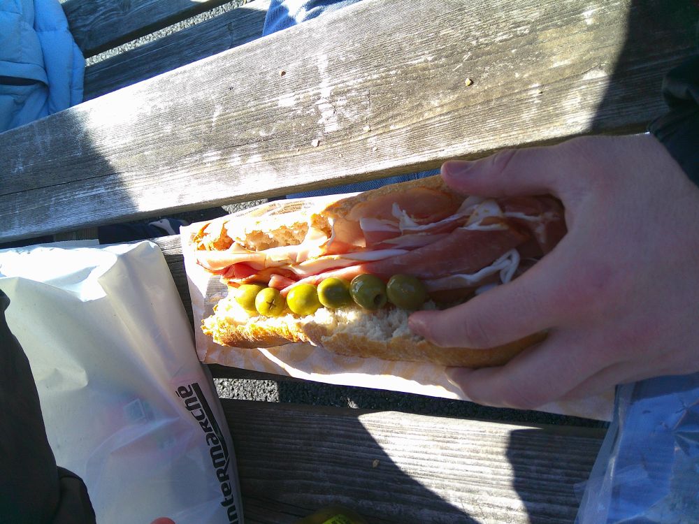 A ham and olive baguette
