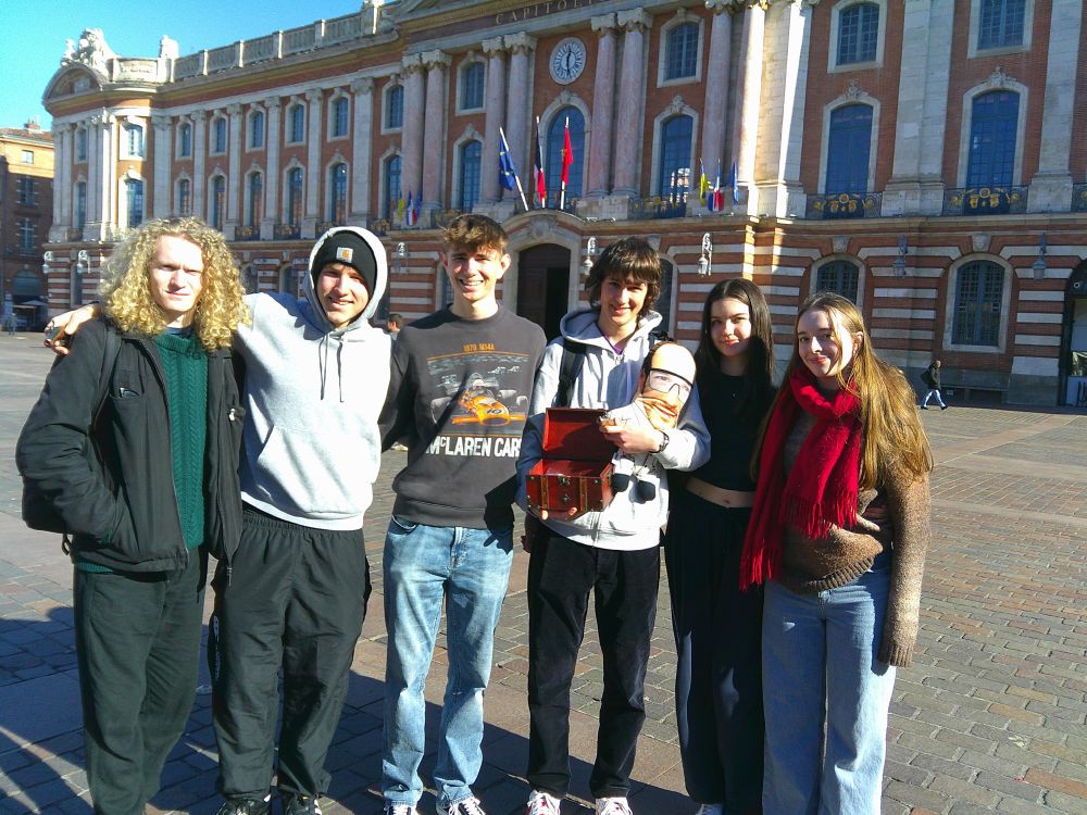 Students with a treasure chest outside La Capitole, Toulouse