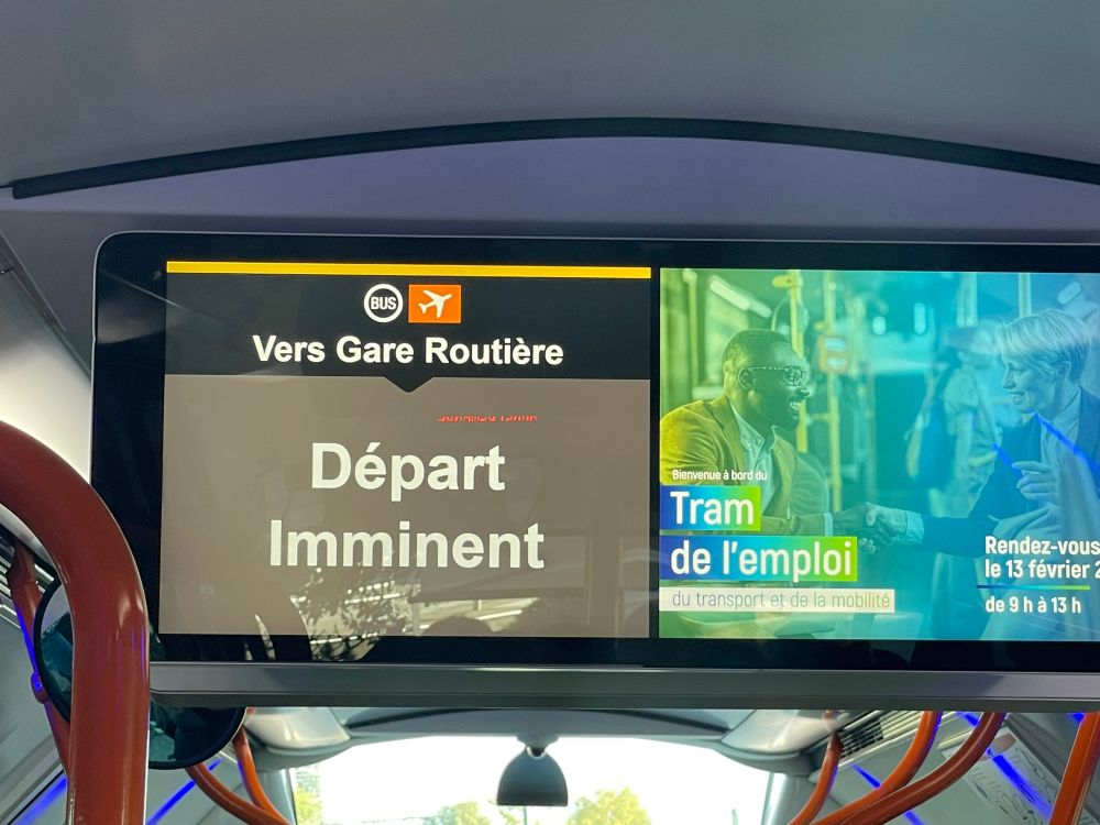 A departure imminent sign on a bus
