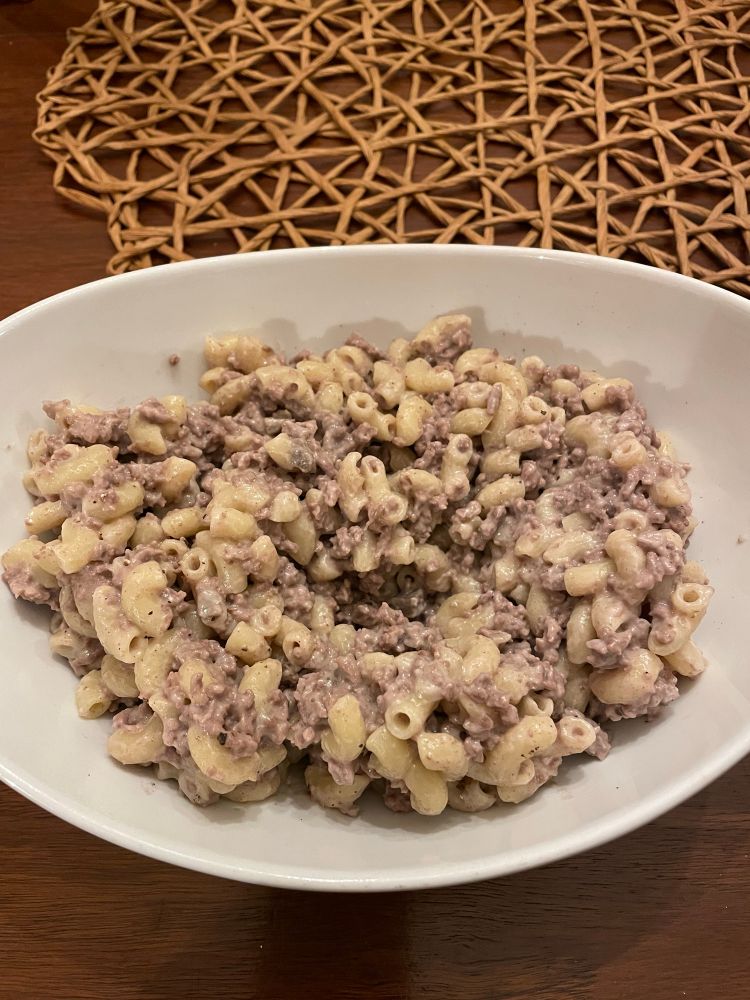 Ground beef, noodles and Campbell’s mushroom soup mixed together. 