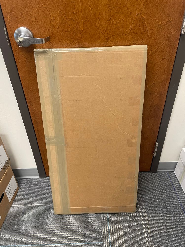 Canvas print packaged in a big strong box. 
