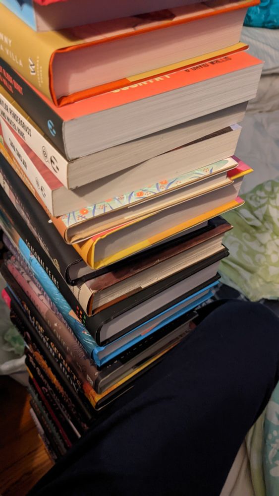 Part of a very tall book stack