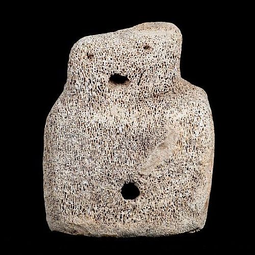 The original Skara Brae Buddo. Neolithic human figure carved from whalebone about 5,000 years ago. Discovered at Skara Brae, Orkney.
