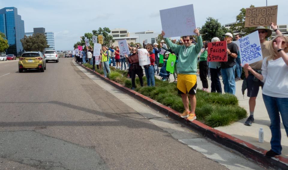 Here's the southeast corner, looking east along La Jolla Village Drive to the I-805 freeway.  Don't worry - I was in a zebra-striped crosswalk and with the light.  I shot as I walked, and was all the way across before the light changed.  Want to keep it legal, right?