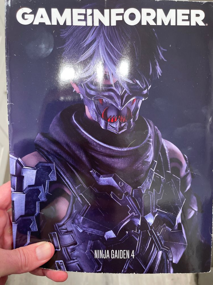 Cover for number 3 / issue 371 of 
Game Informer Magazine - freshly unwrapped and held in my trembling with excitement hand! 🎮🖤